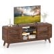 Mid-century modern entertainment center in walnut with grille-style sliding doors, suitable for TVs up to 65 inches.