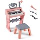 Mini keyboard piano for kids in pink with 25 keys, microphone, and matching stool for musical fun and learning.