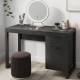 Modern black computer desk with spacious tabletop, cabinet, and drawer, perfect for home office or vanity use.