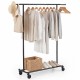 Mobile garment rack with hats and clothes displayed, featuring a robust metal frame and wheels for versatile use.