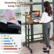 Mobile adjustable standing desk in walnut finish with tilting surface, ideal for comfortable work and study.