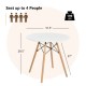 Round dining table with solid beech wood legs, seats up to 4 people, perfect for small spaces and easy assembly.