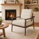 Modern accent chair with rubber wood armrests and legs, featuring a large padded seat for comfort in living rooms.
