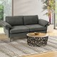 Gray modern fabric loveseat sofa with backrest cushions, arranged with a decorative coffee table in a stylish living.