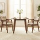 Beige upholstered dining chairs with arms, featuring a solid rubber wood frame, perfect for modern dining spaces.