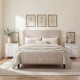 White 3-drawer nightstand with wood grain accents, perfect for bedside storage in a modern farmhouse bedroom.