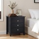 Black 3-drawer nightstand with wood grain accents and sleek knobs, perfect for bedside storage and decor.