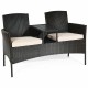 Modern patio conversation set featuring a rattan frame, beige cushions, and a trapezoid coffee table for outdoor.
