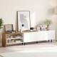 Modern TV stand in white with wood accents, featuring storage cabinets and open shelves for organized entertainment.