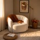 Curved backrest accent chair in white sherpa fabric, perfect for cozy reading corners in living rooms or bedrooms.