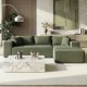 L-shaped modular sectional sofa in green corduroy with deep seats, perfect for comfortable seating for four.