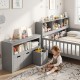 Montessori twin floor bed with gray toy storage cabinet, promoting organization and independence in kids' rooms.