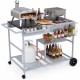 Movable grill table with spacious tabletop, stainless steel condiment caddies, and storage for backyard BBQs.