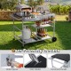 Movable grill table with spacious black tabletop, condiment caddies, and convenient bottle opener for backyard BBQs.