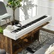 88-key white digital piano with weighted keys, dual-tone modes, and built-in speakers for a professional playing.