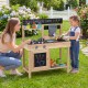 Kids play kitchen outdoor set featuring a wooden mud kitchen with removable sinks and stoves for imaginative play.