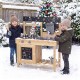 Kids playing with the Mud Kitchen Playset featuring removable sinks and stoves, perfect for outdoor imaginative cooking.