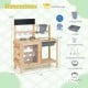 Mud kitchen playset featuring a sink, 12 planter pots, and stainless steel utensils, perfect for outdoor play and.