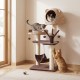 Multi-level cat tree in brown featuring a cozy condo, soft hammock, and playful hanging balls for climbing and napping.