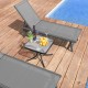 Tempered glass top patio table with heavy-duty metal frame, perfect for garden or poolside use.