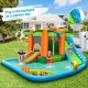 Inflatable water slide park with palm trees, two slides, and splash pool for kids' summer fun in the backyard.
