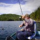 High back folding boat seat in blue with sponge cushion, providing ergonomic support for comfortable fishing trips.