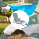 Light green folding patio chaise lounger with rocking design, ergonomic backrest, ideal for poolside or garden.