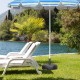 Heavy-duty round umbrella base stand with protective pads, filled with sand or water for stability, ideal for patio use.