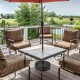 Heavy-duty round umbrella base stand with a fillable reservoir for stability, suitable for patio and garden use.