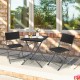 Black 3-piece patio bistro set with folding wicker chairs and table, perfect for outdoor relaxation on the balcony or.