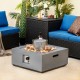 Square gray propane fire pit table with fountain, 50,000 BTU, surrounded by outdoor seating for elegant patio ambiance.