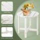 Round white Adirondack side table with slatted design, weather-resistant HDPE material, perfect for outdoor use.