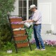 5-tier vertical raised garden bed with wheels and brown planter boxes, ideal for cultivating plants in outdoor spaces.