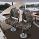 Camouflage folding boat seat with ergonomic backrest and high-density sponge padding for comfort and easy storage.
