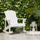 White outdoor wooden kid Adirondack rocking chair with slatted seat, perfect for relaxing in your garden or patio.