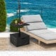 Fillable black umbrella base with table tray, designed for stability and versatility in outdoor settings.