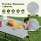 Folding heavy-duty aluminum camping table with wide slats, waterproof surface, and lightweight design for outdoor use.