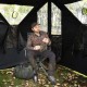 360-degree silent swivel hunting chair in black with adjustable armrests, ideal for comfortable outdoor activities.