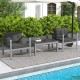Contemporary gray sofa chairs with WPC armrests and cushions, perfect for outdoor relaxation by the pool.