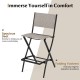 Outdoor folding bar height stool with spacious seat and folding footrest, designed for comfort and easy portability.
