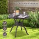 Round 31.5-inch cast aluminum patio dining table with umbrella hole, featuring a classic design for outdoor use.