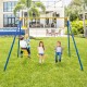 Children enjoying the blue metal swing set with two swing seats and glider seats in a backyard setting.