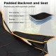 Padded backrest and seat of the black folding camping chair with adjustable footrest for optimal comfort outdoors.