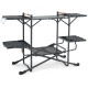 Folding portable outdoor cook station with heat-resistant aluminum tabletop and multiple storage shelves for easy food.