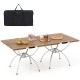 Folding camping table with wood-grain tabletop and aluminum legs, perfect for picnics, camping, or BBQs.