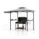 Grill gazebo with double-tiered gray canopy, side awning, and shelves for outdoor cooking and shade coverage.
