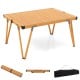 Folding camping table with a waterproof brown surface, sturdy aluminum frame, and portable storage bag for picnics and.