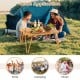 Folding camping table in brown with waterproof surface, perfect for picnics and camping, shown in outdoor setting.