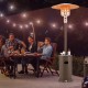 50000 BTU propane patio heater with round table design in brown, providing 360° heat for outdoor gatherings.