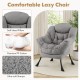 Modern accent chair in gray with soft head pillow, ergonomic design, and folding footrest for versatile comfort.